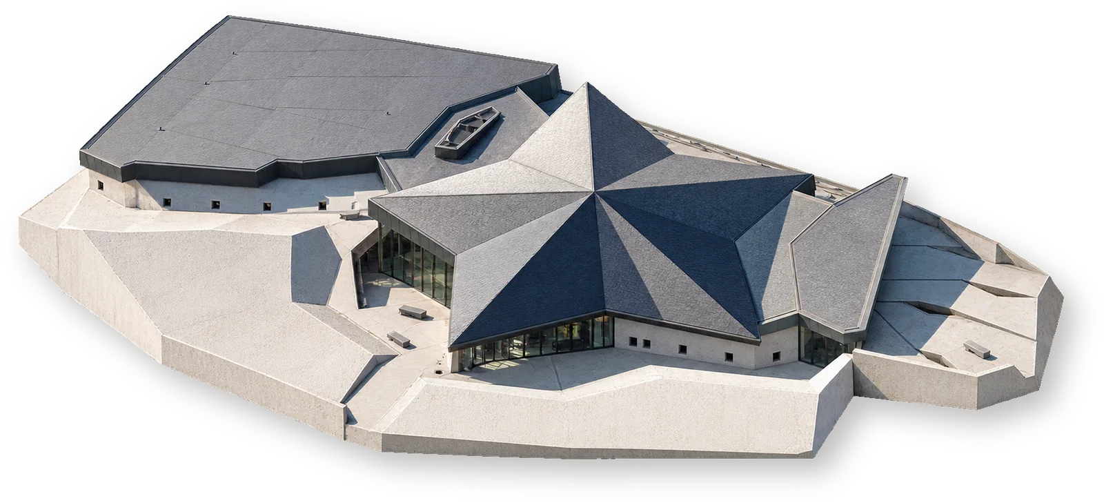 Историческое здание Bastogne War Museum в конфигурации открытия 2014 года Целый объединённый корпус Bastogne War Museum в конфигурации проекта 2013 года: звёздчатый музей и первая низкая оболочка